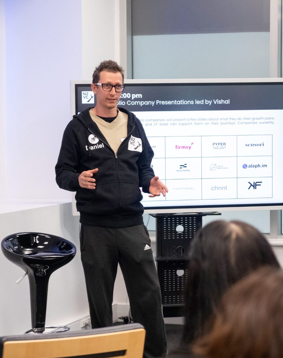 A founder presenting to the room during the portfolio company presentations