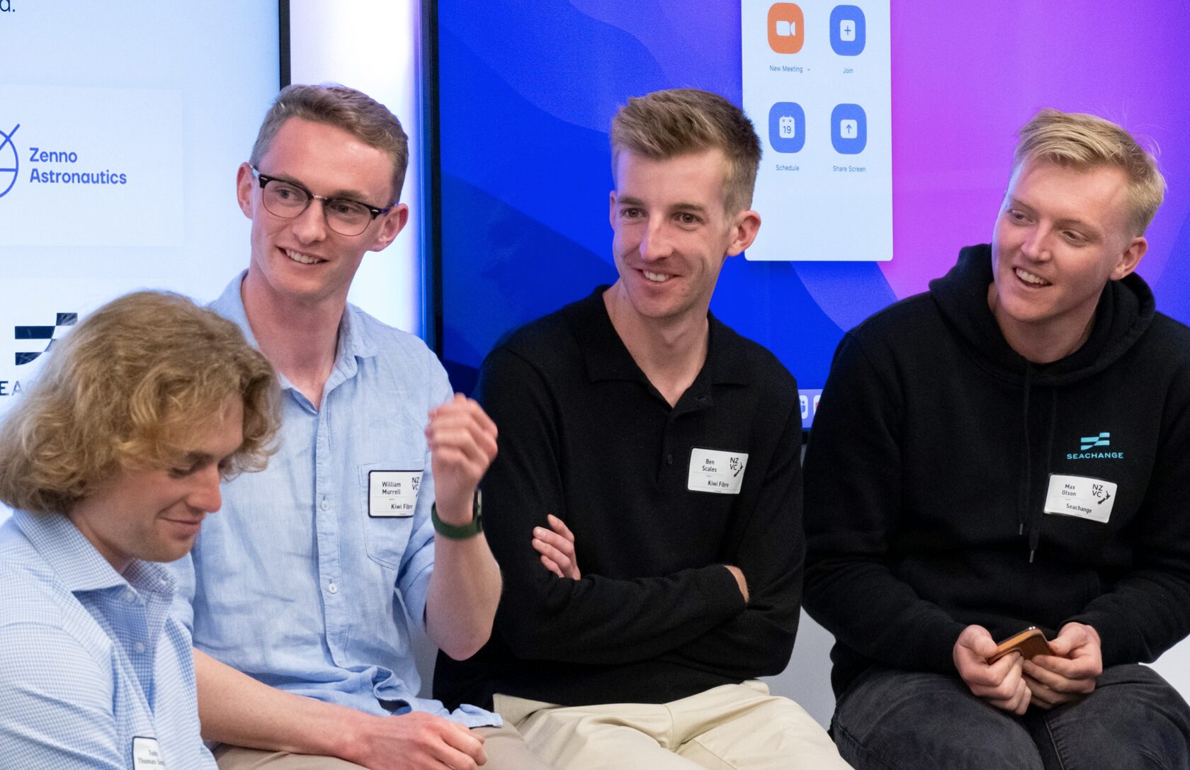Four members of the Zenno Astronautics team seated together in the audience