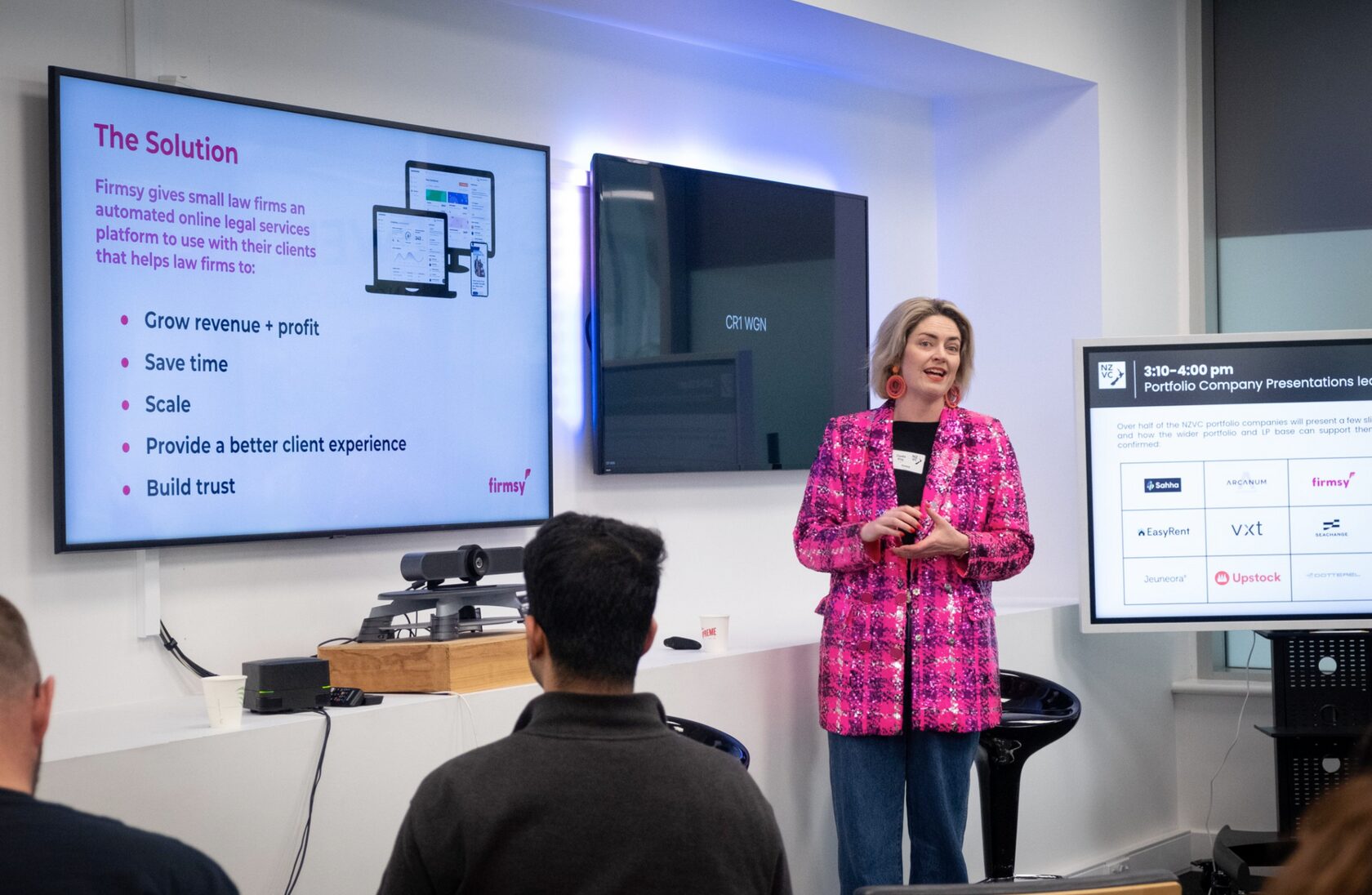 A founder presenting an online legal service during the portfolio company presentations