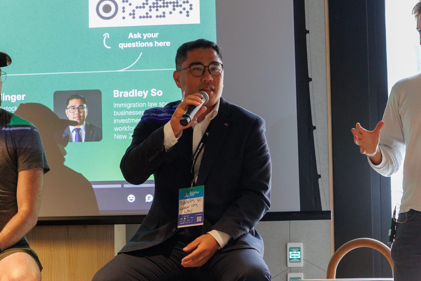 A panelist speaking into a microphone during the Agentic AI Future session