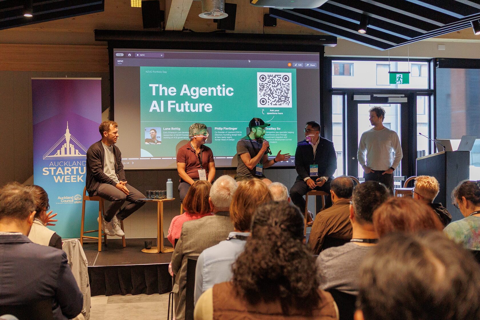 The Agentic AI Future panel on stage in front of a full seated audience at NZVC Portfolio Day 2025