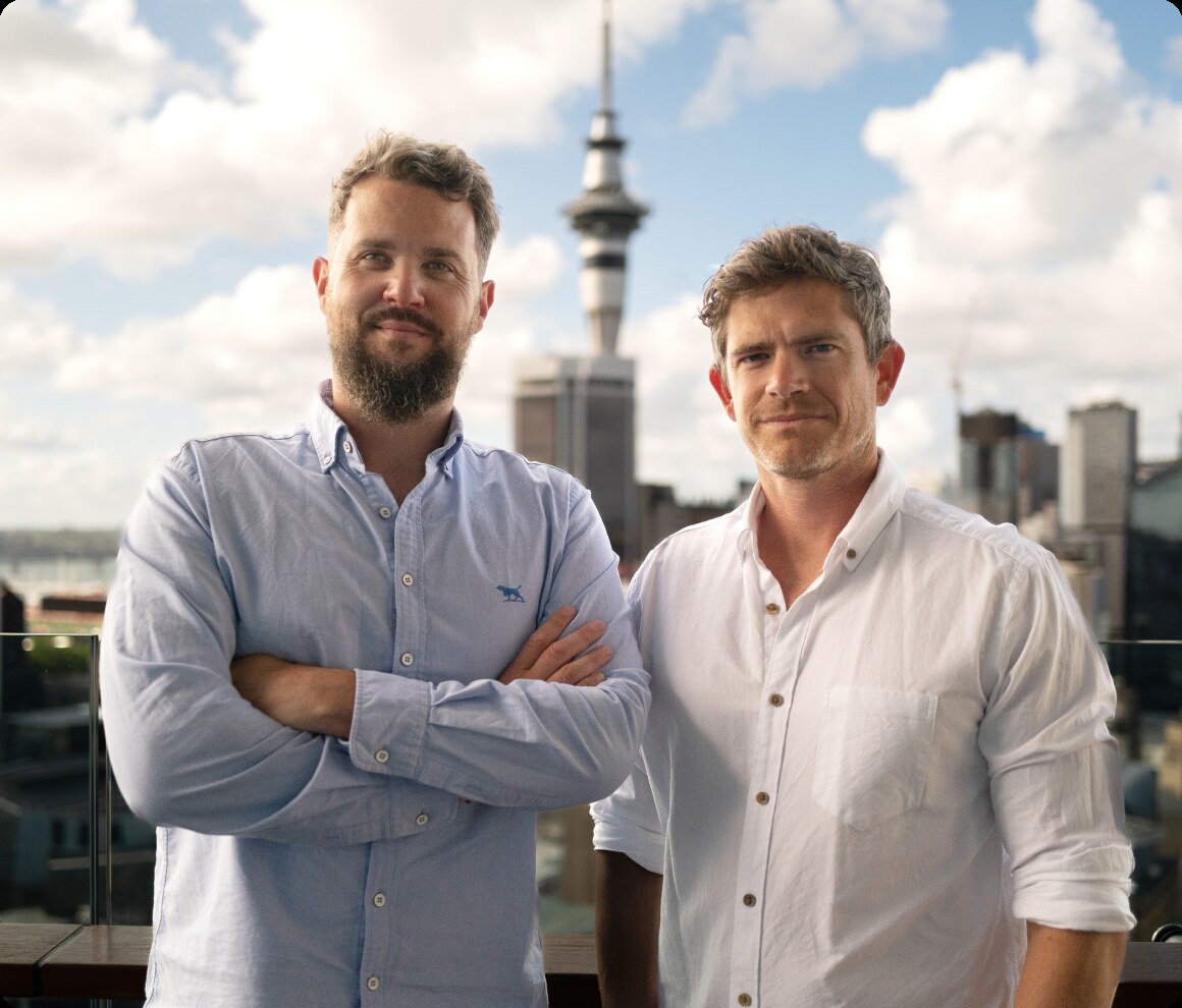 SquareOne co-founders Jamie Jermain and Jovan Pavlicevic on a rooftop in Auckland.